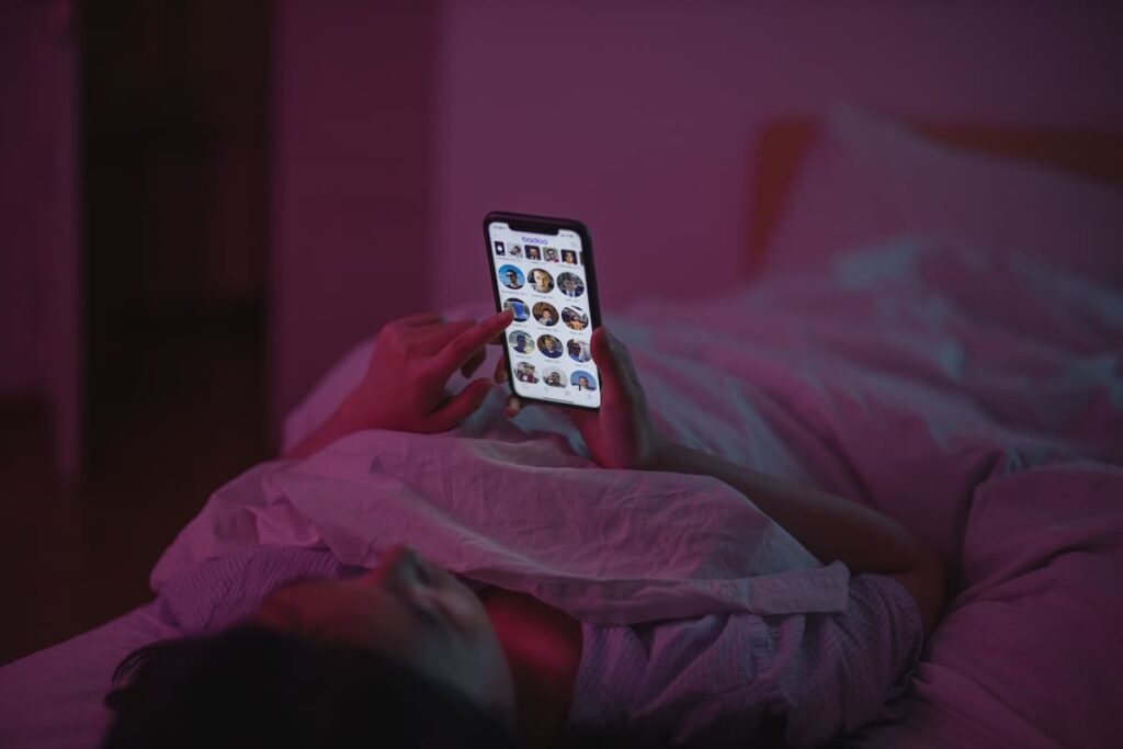 person experiencing social media comparison on phone